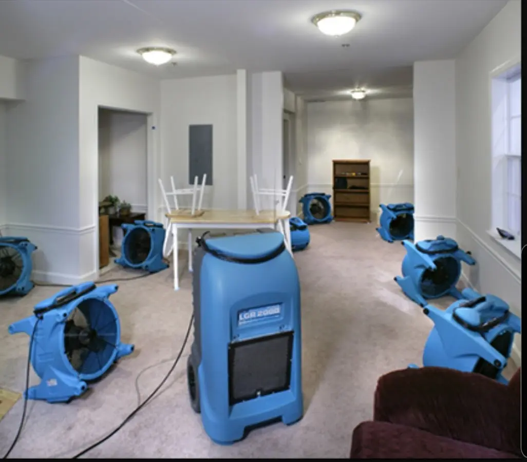 Air movers and dehumidifier setup for Water Extraction & Removal in La Follette